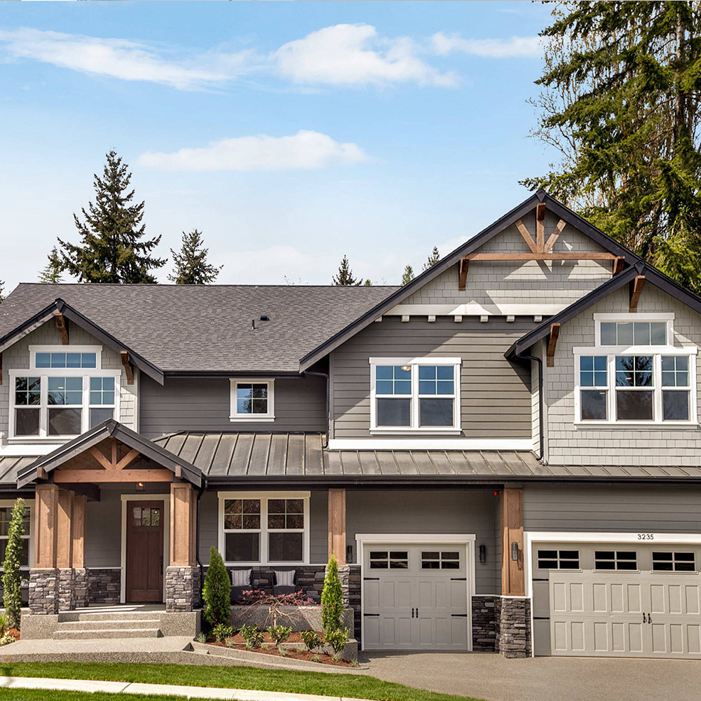 Residential siding installation with clean exterior transitions.